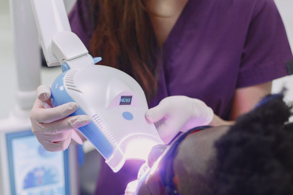 Composite bonding cured with a dental curing light